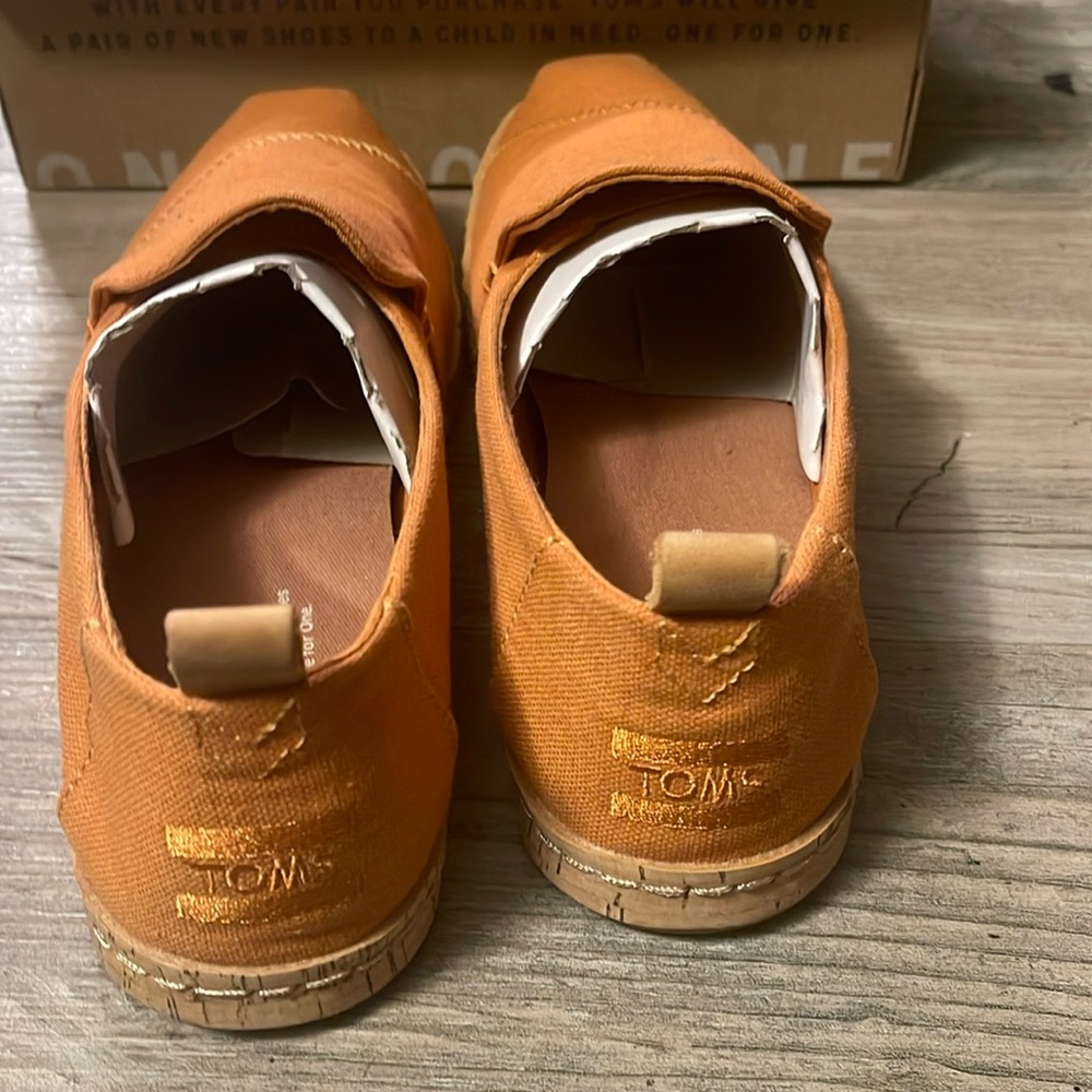 TOMS slip ons